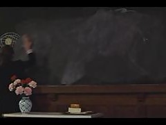 Female Teacher In Front of the Students 4